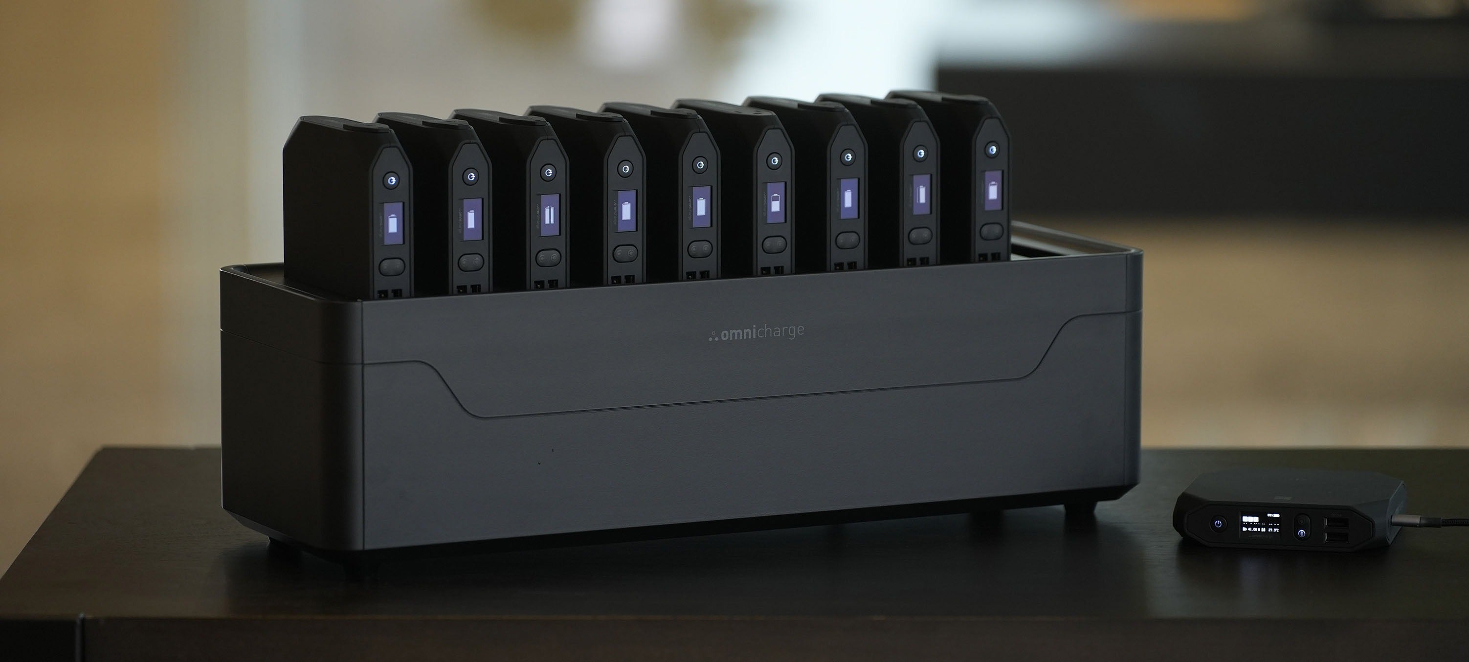 Omni Power Station with power banks on a table