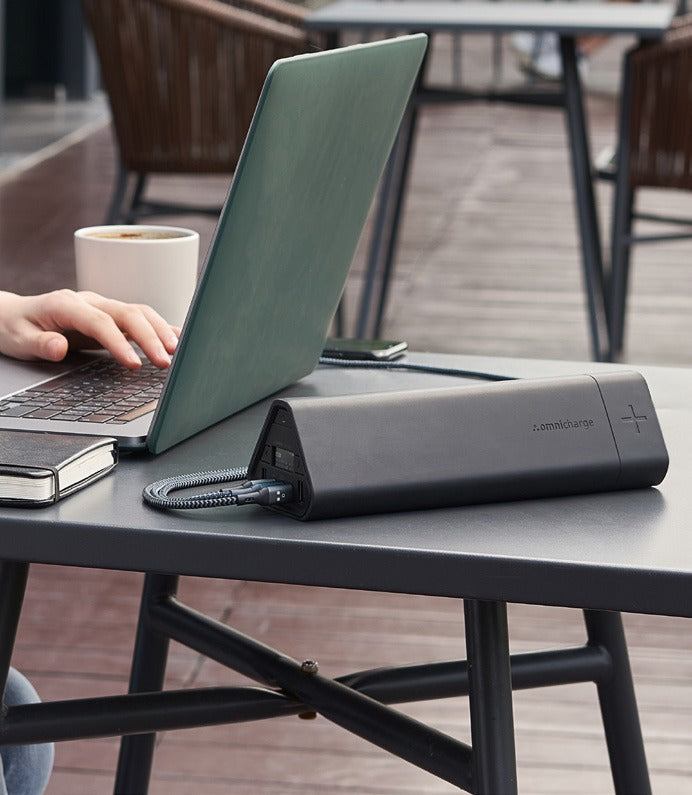 Working outdoors on a laptop powered by an Omni 40+