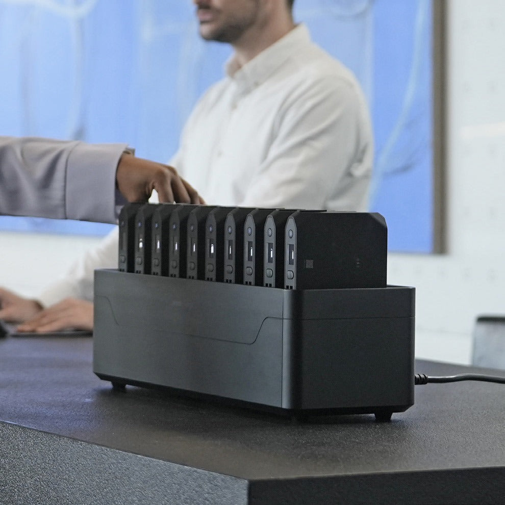 Taking a power bank from an Omni Power Station in a classroom