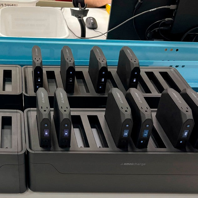 Power banks charging in a tray